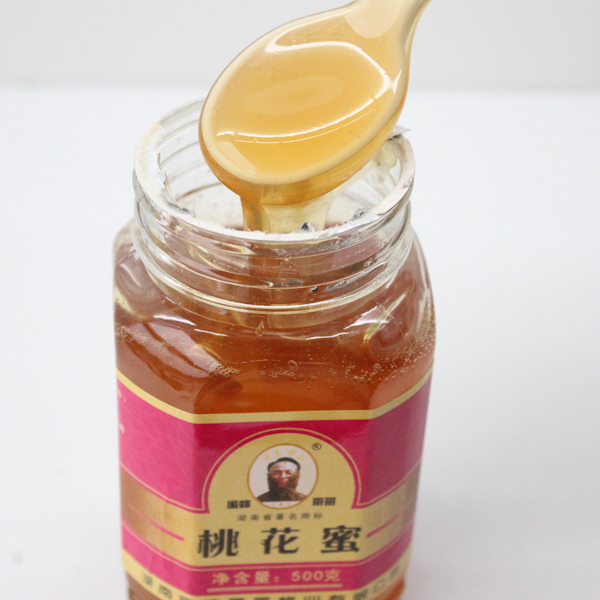 供應(yīng)蜜蜂哥哥500g純蜂蜜桃花蜜