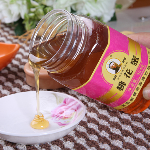 供應(yīng)蜜蜂哥哥500g純蜂蜜桃花蜜